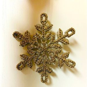 Gold sparkle snowflake looks great on a tree, over a door or entry way